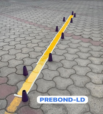 PREBOND-LD floor marking paint on outdoor paver pathway